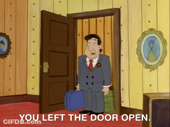 Guy In Suit There Spare Room Door Opening GIF