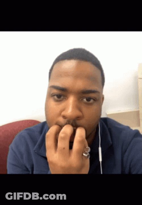 Guy Looking Around Nail Biting GIF
