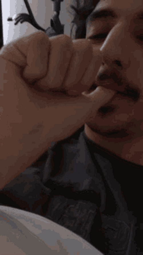 Guy Lying Bed Thumb Sucking GIF
