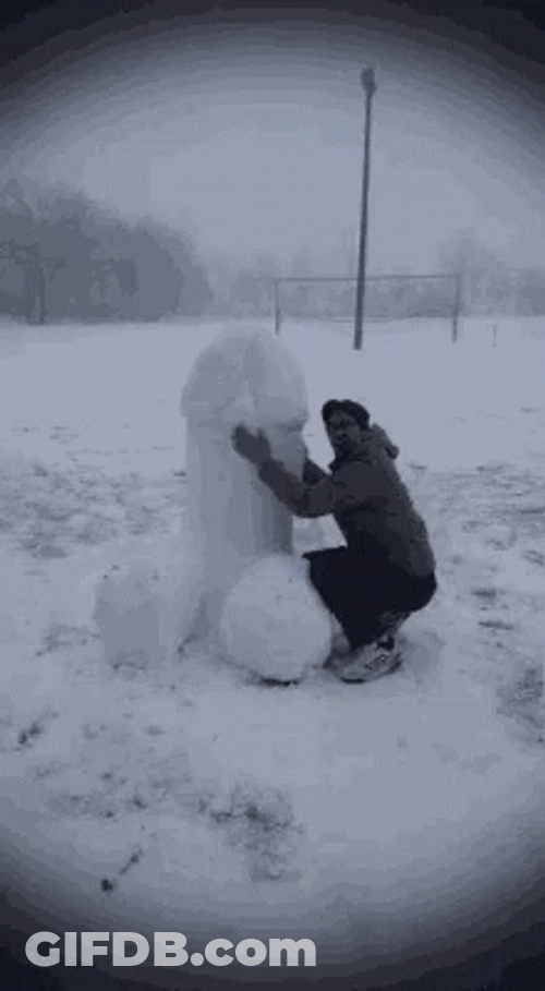 Guy Making Snowman Into Funny One GIF