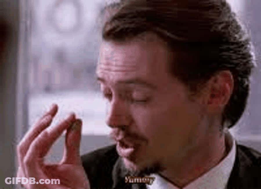 Guy Making Yummy Gesture GIF
