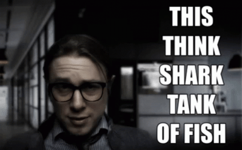 Guy Mouthing Shark Tank Of Fish GIF