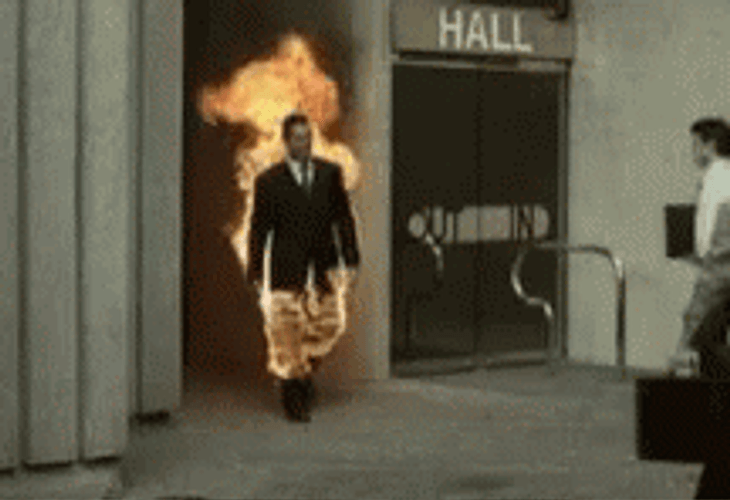 Guy On Fire Shaking Hands GIF