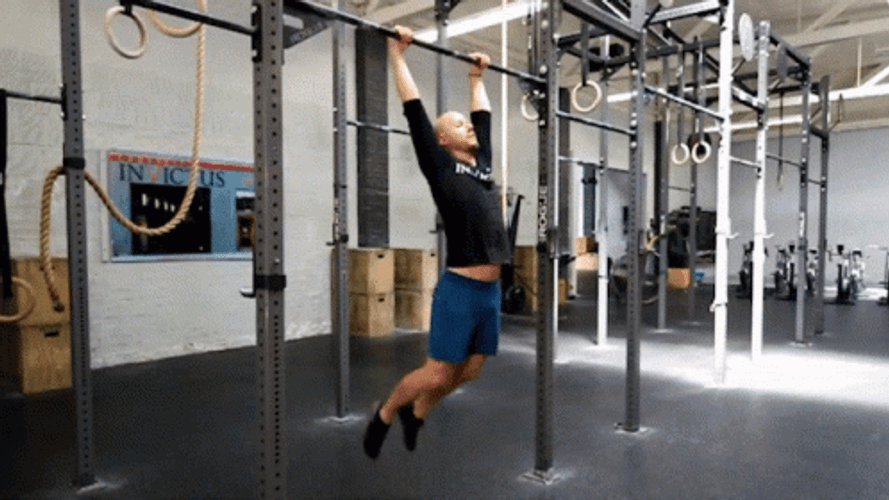 Guy On Gym Pull Ups GIF