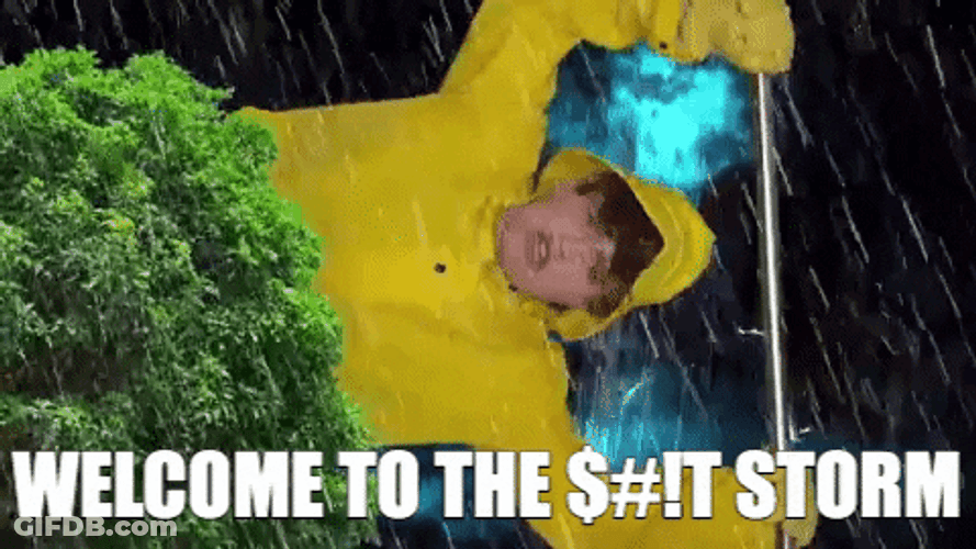 Guy On Raincoat DuringThunderstorm GIF