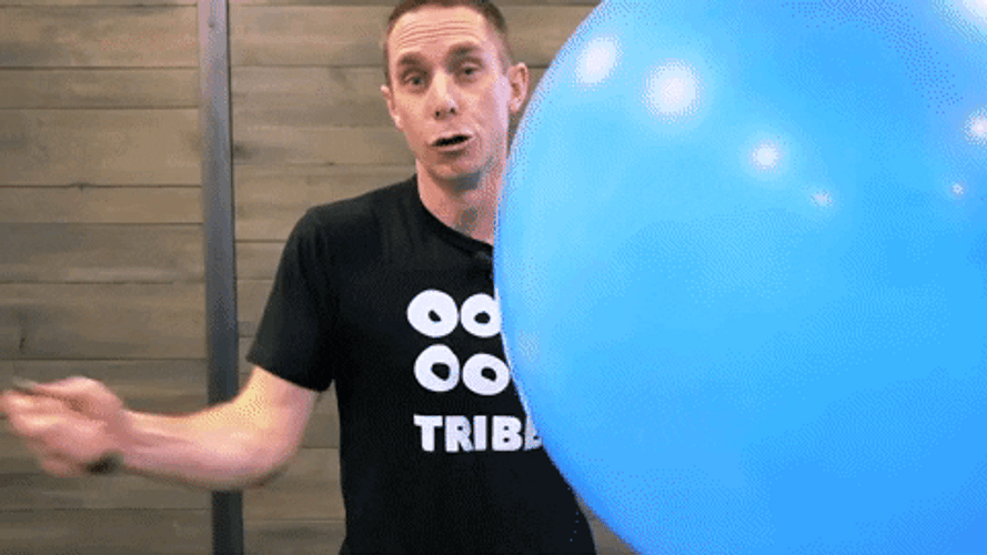 Guy Popping Balloon GIF