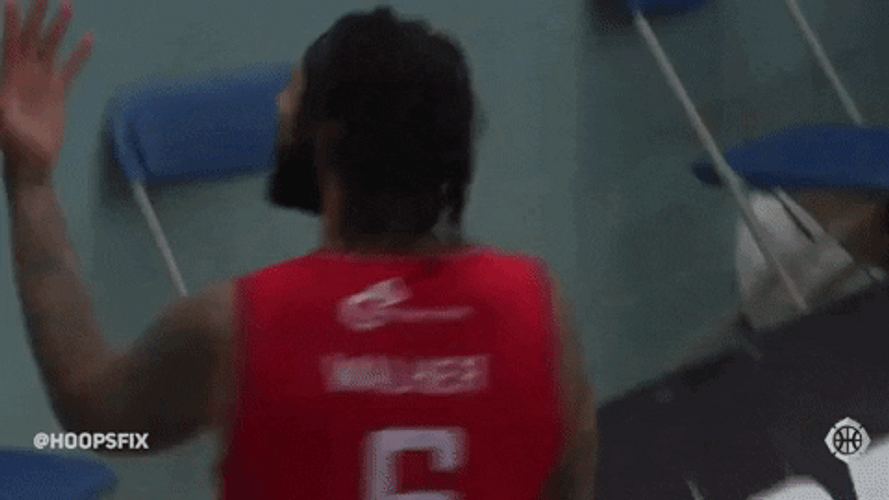 Guy Raises Lefty Hand GIF