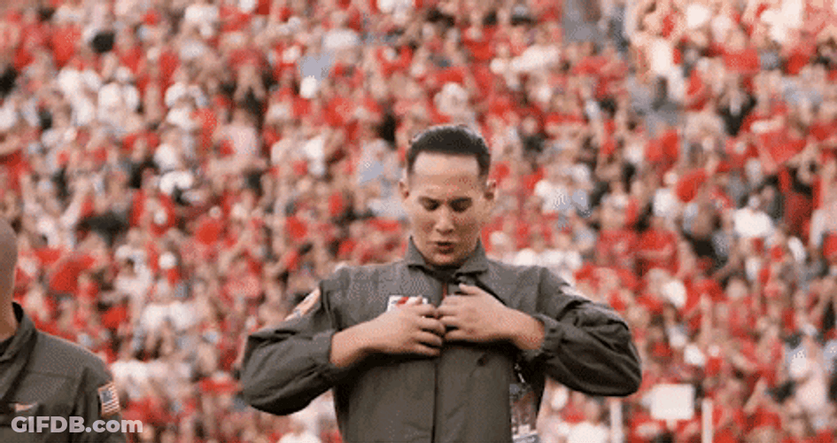 Guy Showing His Dawgs Tshirt GIF