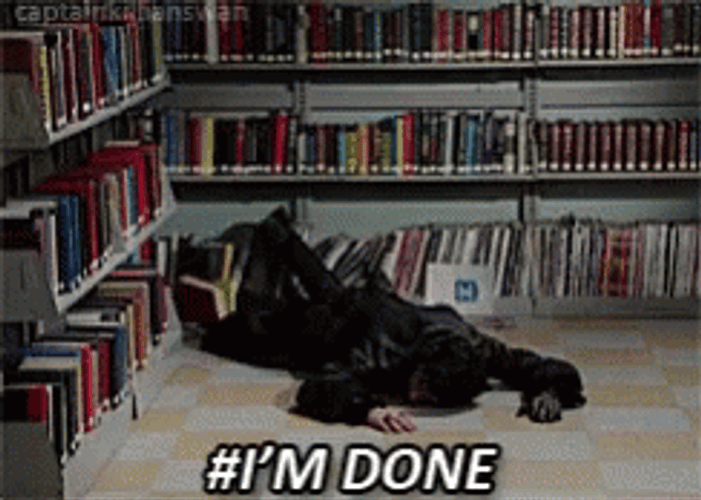 Guy Sleeping In The Library GIF