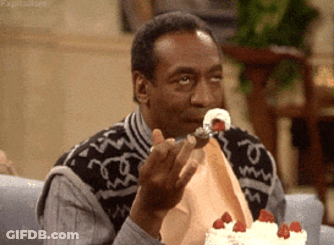 Guy Smelling Yummy Cake GIF