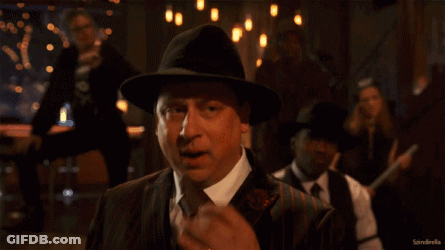 Guy Smoking Cigar And Winked GIF