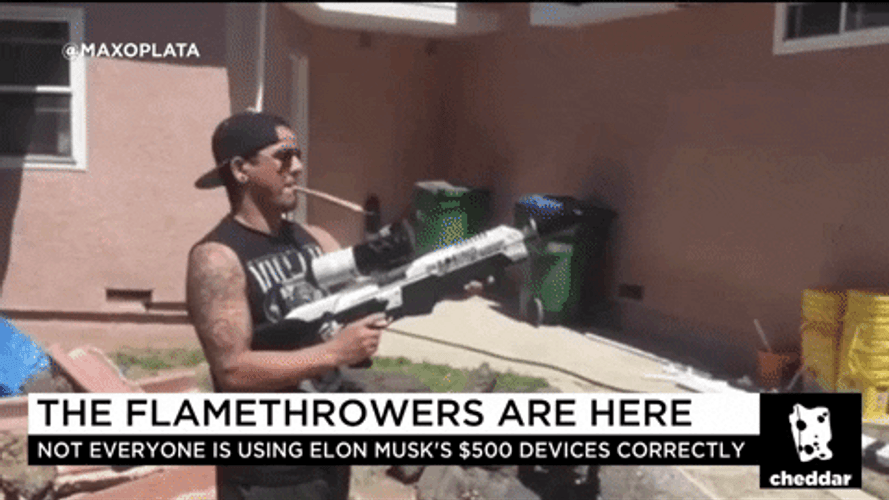 Guy Smoking Using Flamethrower GIF