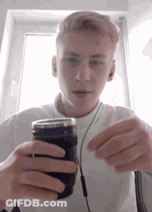 Guy Swallowing Tea Bag GIF