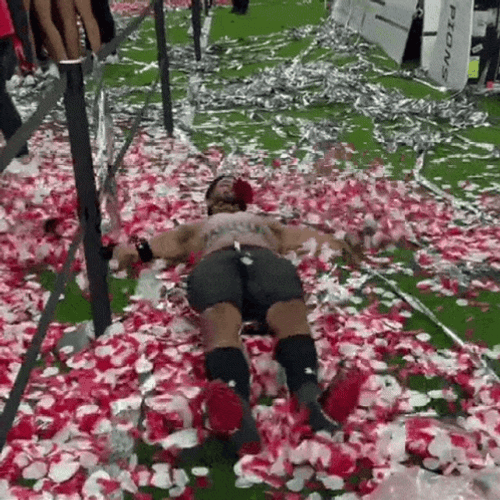 Guy Swimming On The Confetti Cannon GIF