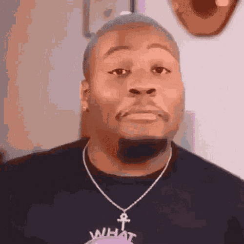 Guy Trying Not To Laugh GIF