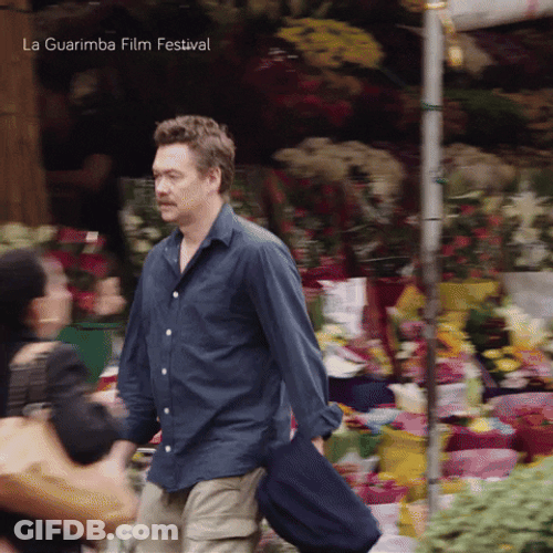Guy Walking Fast To Explore City GIF