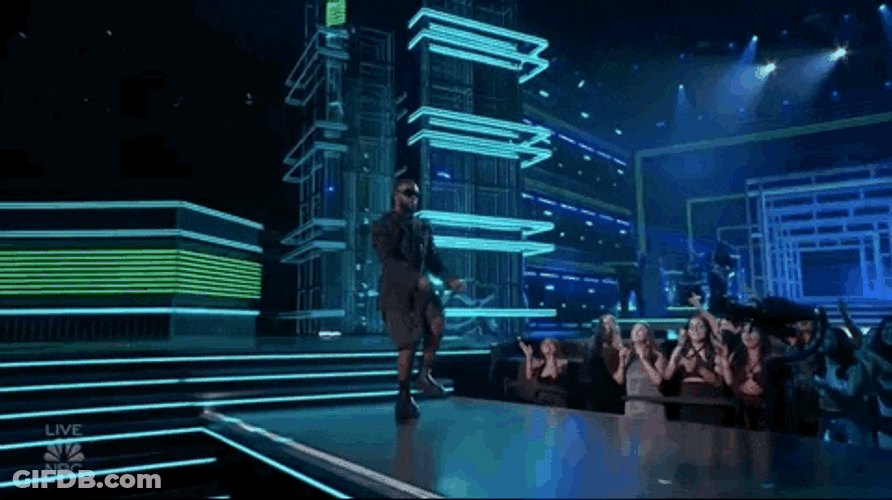 Guy Walking On Stage GIF