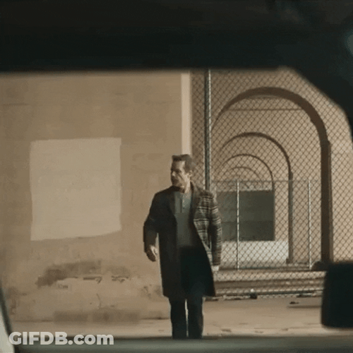 Guy Walking Toward His Car GIF