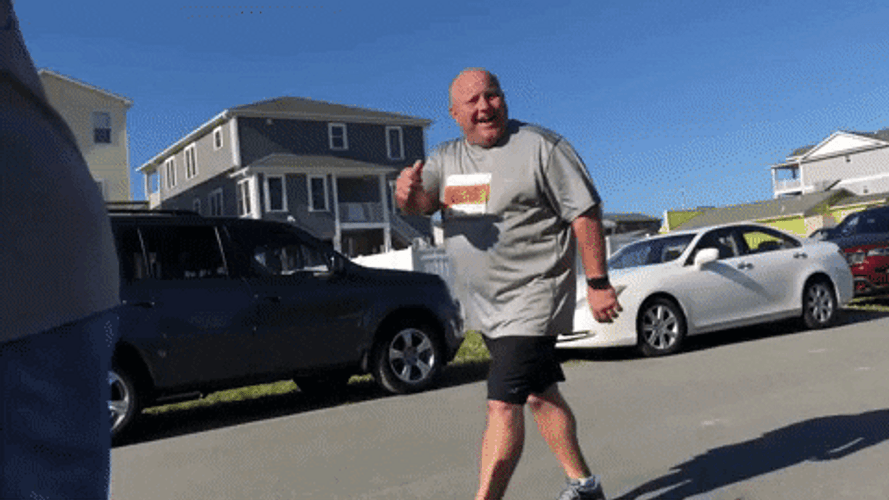 Guy Walking With A Thumbs Up GIF