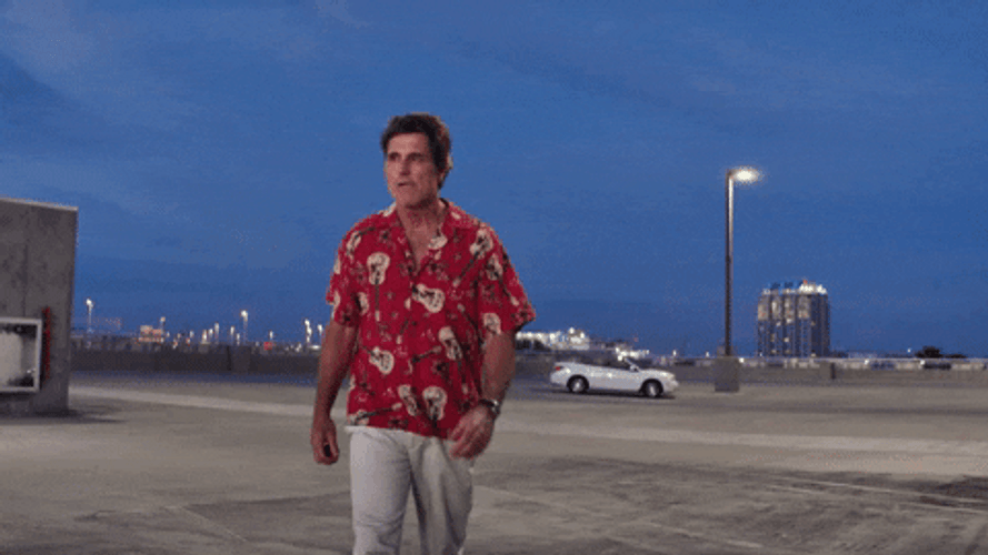 Guy Walking With Karate Kick GIF