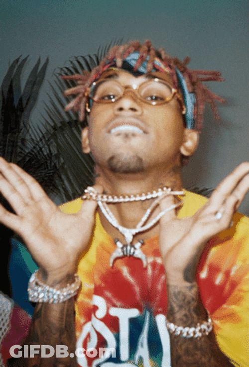 Guy Wearing Costume As Tribal Chief GIF