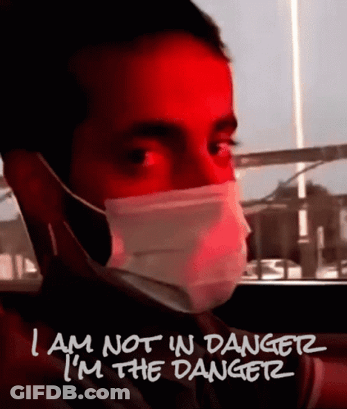 Guy Wearing Face Mask Staring Im In Danger GIF