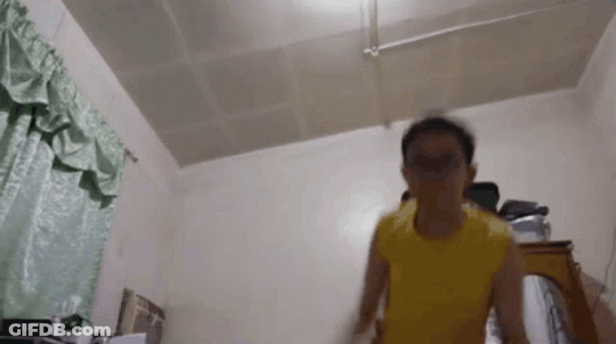Guy Wearing Yellow Shirt Punch GIF
