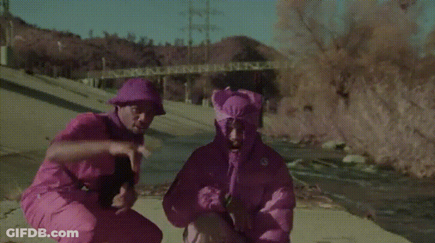 Guys With Purple Costume Pointing GIF