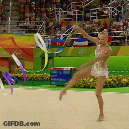 Gymnast Performing In Front Of Omega Sign GIF