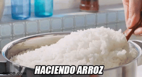 Haciendo Arroz Rice Stirred With Wooden Spoon GIF