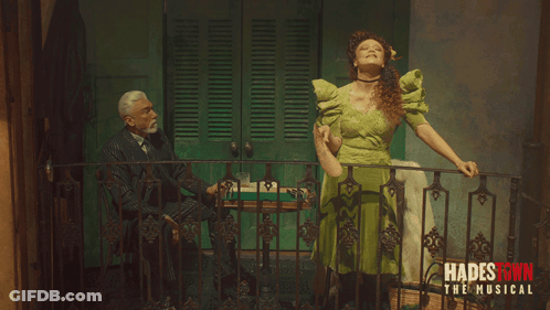 Hadestown Musical Poster Man And Woman GIF