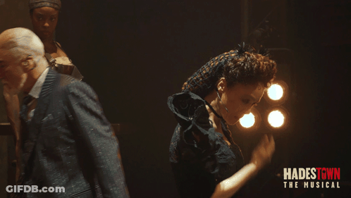 Hadestown Musical Poster Man And Woman Dancing GIF