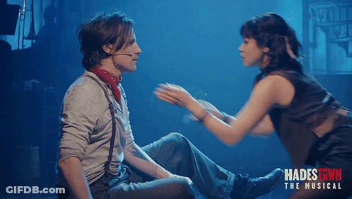 Hadestown Musical Poster Man And Woman GIF