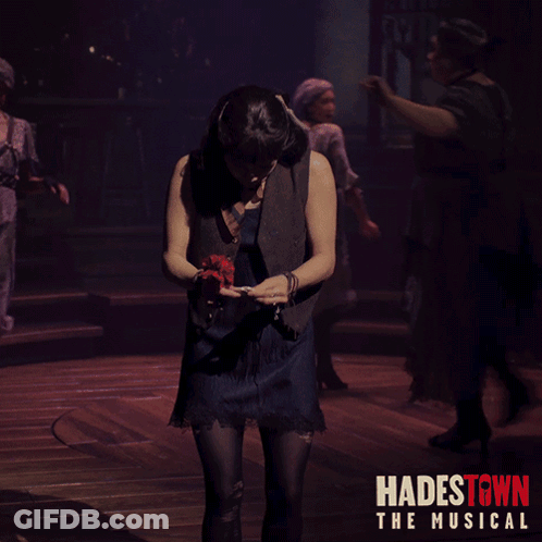 Hadestown Poster Woman Holding Microphone GIF