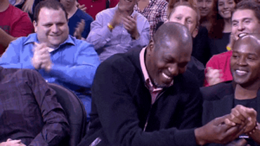 Hakeem Olajuwon Waving Around GIF