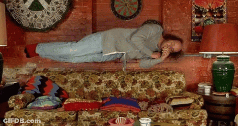 Half Baked Guy On Couch Floating GIF