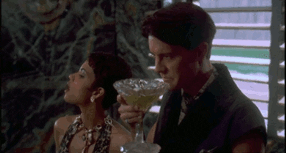 Halle Berry Blowing Smoke GIF