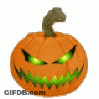 Halloween Pumpkin With Green Eyes And Spider GIF