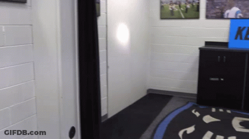 Hallway With KC Sign GIF