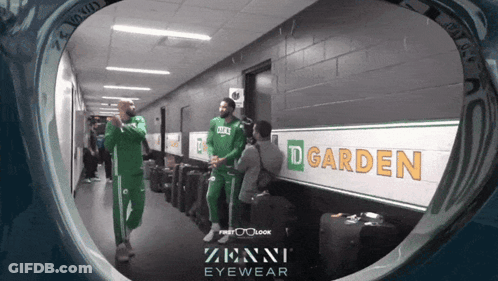 Hallway With Sign Saying D Garden GIF