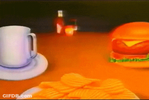 Hamburger Coffee And Potato Chips On A Table GIF