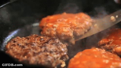 Hamburger Patties Cooking In Pan With Sauce GIF