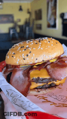 Hamburger With Bacon And Cheese On McDonald's Paper GIF