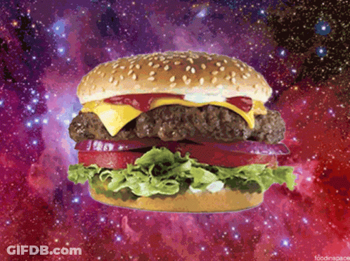 Hamburger With Cheese Lettuce Tomato And Ketchup On Galaxy Background GIF