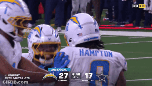 Hampton Hugging Another Player On Field GIF