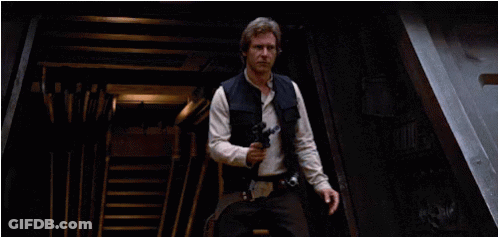 Han Solo From Star Wars Is Holding A Gun GIF