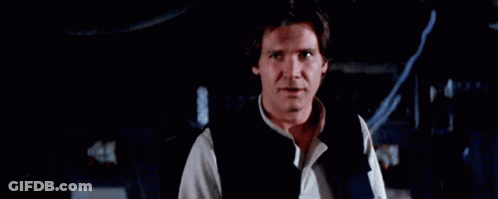 Han Solo Wearing Black Vest And White Shirt GIF