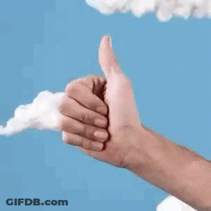 Hand Giving Thumbs Up In Front Of Blue Sky With Clouds GIF