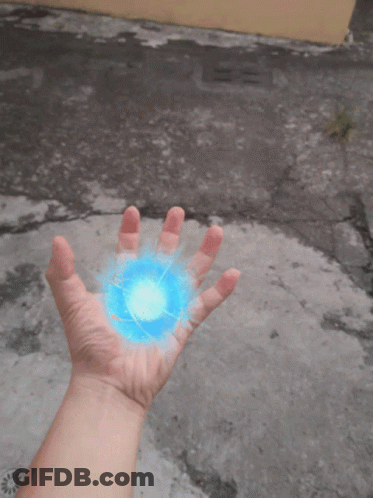 Hand Holding Blue Ball GIF