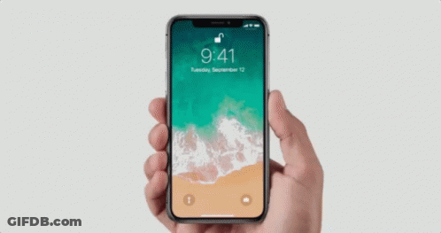 Hand Holding Cell Phone Green Brown Background GIF